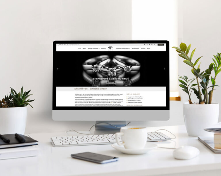 Website Design By Three Girls Media For Graham Tom Diamond Expert Desktop Mockup